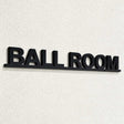 Ψηφιακή απεικόνιση επιγραφής BALL ROOM σε μαύρο ακρυλικό